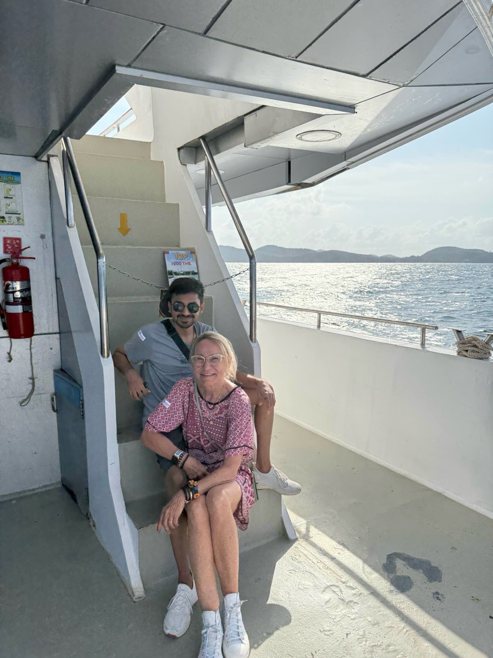 Burhan Mirza's employee Zaeem Siddiqui with the victim Elisabeth in Thailand.