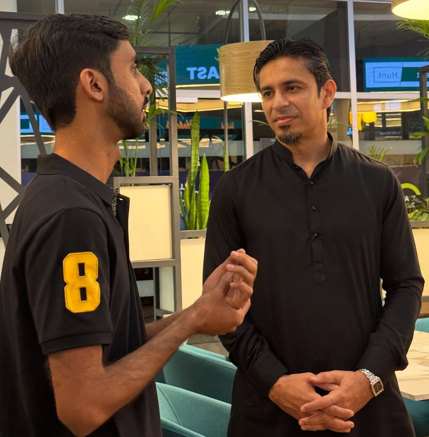 Burhan Mirza with unknown male.